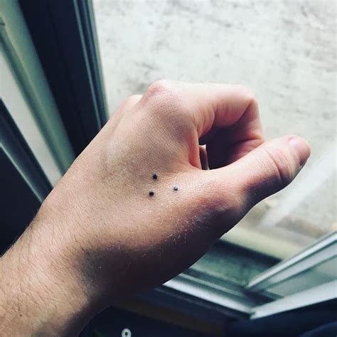 tattoo between thumb and index finger|meaning of 3 dots tattoo.